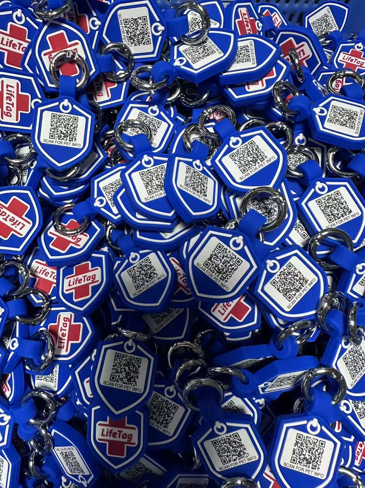 Bulk finished silicone pet ID tags from production line